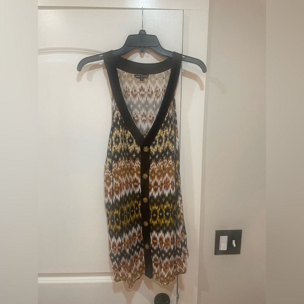Sleeveless top with button details
